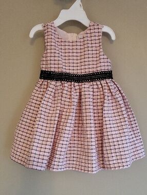Pink check fit-and-flare dress with black waistband.